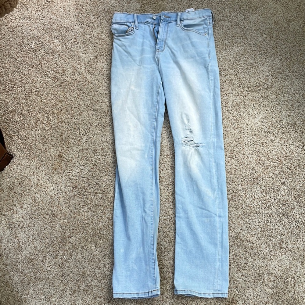 Mens or kids light blue ripped jeans